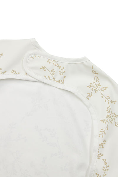 Meyco Baby - Bib with sleeves - Branches Sand